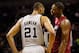 Mar 31, 2013; San Antonio, TX, USA; San Antonio Spurs forward Tim Duncan (21) and Miami Heat center Chris Bosh (right) exchange words during the second half at the AT&T Center. The heat won 88-86. Mandatory Credit: Soobum Im-USA TODAY Sports