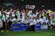 Japan celebrate after qualifying for the 2014 World Cup on Tuesday.