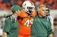 Nov 1, 2012; Miami, FL, USA; Miami Hurricanes tight end Dyron Dye (49) is helped off the field during third quarter against Virginia Tech Hokies at Sun Life Stadium. Miami won 30-12. Mandatory Credit: Steve Mitchell-USA TODAY Sports