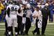 Sep 23, 2012; Indianapolis, IN, USA; Indianapolis Colts coach Chuck Pagano walks with wide receiver Austin Collie (17) as he is injured and helped off the field against the Jacksonville Jaguars at Lucas Oil Stadium. Jacksonville defeats Indianapolis 22-17. Mandatory Credit: Brian Spurlock-USA TODAY Sports