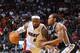 Jan. 17, 2012; Miami, FL, USA; Miami Heat small forward LeBron James (6) drives to the basket past San Antonio Spurs small forward Kawhi Leonard (2) during the second half at American Airlines Arena. Miami won 120-98. Mandatory Credit: Steve Mitchell-USA TODAY Sports