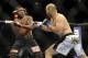 Jan 26, 2013; Chicago, IL, USA; Rampage Jackson fights against Glover Teixeira (black and white shorts) during UFC on FOX 6 at the United Center. Mandatory Credit: David Banks-USA TODAY Sports