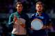 MADRID, SPAIN - MAY 12: Rafael Nadal (L) of Spain stands with runner up Stanislas Wawrinka of Switzerland holding their trophies after Nadal won the final on day nine of the Mutua Madrid Open tennis tournament at the Caja Magica on May 12, 2013 in Madrid, Spain. (Photo by Gonzalo Arroyo Moreno/Getty Images)