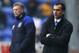 WIGAN, ENGLAND - FEBRUARY 04: Roberto Martinez of Wigan and David Moyes of Everton watch proceedings during the Barclays Premier League match between Wigan Athletic and Everton at DW Stadium on February 4, 2012 in Wigan, England. (Photo by Clive Mason/Getty Images)