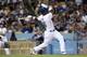LOS ANGELES, CA - JUNE 04: Yasiel Puig #66 of the Los Angeles Dodgers hits a three run home run in the fifth inning to tie the score with the San Diego Padres at Dodger Stadium on June 4, 2013 in Los Angeles, California. (Photo by Stephen Dunn/Getty Images)