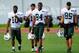 July 28, 2012; Cortland, NY, USA; New York Jets wide receivers Santonio Holmes (10) Royce Pollard (18) Stephen Hill (84) and Chaz Schilens (85) walk off the field following training camp at SUNY Cortland. Mandatory Credit: Rich Barnes-USA TODAY Sports