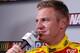 Clint Bowyer jokes with reporters before the 2013 season during media day in Daytona. Credit: Dwight Drum