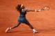 PARIS, FRANCE - JUNE 06: Serena Williams of United States of America plays a backhand in her womens' singles semi-final match against Sara Errani of Italy during day twelve of the French Open at Roland Garros on June 6, 2013 in Paris, France. (Photo by Clive Brunskill/Getty Images)