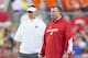 Sep 15, 2012; Madison, WI, USA; Utah State Aggies head coach Gary Andersen (left) and Wisconsin Badgers head coach Bret Bielema (right) talk during warm-ups prior to their game at Camp Randall Stadium. Mandatory Credit: Jeff Hanisch-USA TODAY Sports