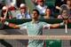 PARIS, FRANCE - JUNE 05: Novak Djokovic of Serbia celebrates match point during his Men's Singles quarter final match against Tommy Haas of Germany on day eleven of the French Open at Roland Garros on June 5, 2013 in Paris, France. (Photo by Matthew Stockman/Getty Images)