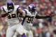 Dec 23, 2012; Houston, TX, USA; Minnesota Vikings defensive tackle Fred Evans (90) celebrates a sack with defensive tackle Letroy Guion (98) against the Houston Texans during the third quarter at Reliant Stadium. The Vikings won 23-6. Mandatory Credit: Thomas Campbell-USA TODAY Sports