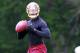 May 23, 2013; Ashburn, VA, USA; Washington Redskins quarterback Robert Griffin III (10) prepares to throw the ball during organized team activities at Redskins Park. Mandatory Credit: Geoff Burke-USA TODAY Sports
