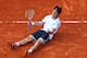 PARIS, FRANCE - JUNE 07: David Ferrer of Spain celebrates match point during the men's singles semi-final match against Jo-Wilfried Tsonga of France on day thirteen of the French Open at Roland Garros on June 7, 2013 in Paris, France. (Photo by Julian Finney/Getty Images)