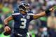 Jan 13, 2013; Atlanta, GA, USA; Seattle Seahawks quarterback Russell Wilson (3) throws a pass in the fourth quarter of the NFC divisional playoff game against the Atlanta Falcons at the Georgia Dome. The Falcons won 30-28. Mandatory Credit: Daniel Shirey-USA TODAY Sports