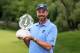 DUBLIN, OH - JUNE 02: Matt Kuchar poses with the trophy after his two-stroke victory at the Memorial Tournament presented by Nationwide Insurance at Muirfield Village Golf Club on June 2, 2013 in Dublin, Ohio. (Photo by Scott Halleran/Getty Images)