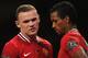 MANCHESTER, ENGLAND - NOVEMBER 05: Wayne Rooney and Nani of Manchester United look on during the Barclays Premier League match between Manchester United and Sunderland at Old Trafford on November 5, 2011 in Manchester, England. (Photo by Michael Regan/Getty Images)