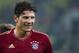 GUANGZHOU, GUANGDONG - JULY 26: Mario Gomez of Bayern Munich smiles during a friendly match against VfL Wolfsburg as part of the Audi Football Summit 2012 on July 26, 2012 at the Guangdong Olympic Sports Center in Guangzhou, China. (Photo by Victor Fraile/Getty Images)