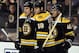 BOSTON, MA - JANUARY 05: David Krejci #46 of the Boston Bruins is congratulated by teammates Milan Lucic #117 and Nathan Horton #18 after Krejci scored in the second period against the Calgary Flames on January 5, 2012 at TD Garden in Boston, Massachusetts. (Photo by Elsa/Getty Images)