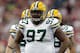 GLENDALE, AZ - JANUARY 03: Johnny Jolly #97 of the Green Bay Packers looks on from the field against the Arizona Cardinals at University of Phoenix Stadium on January 3, 2010 in Glendale, Arizona. (Photo by Jamie Squire/Getty Images)