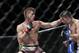 May 25, 2013; Las Vegas, NV, USA; Mike Pyle punches Rick Story during UFC 160 at the MGM Grand Garden Arena. Mandatory Credit: Gary A. Vasquez-USA TODAY Sports