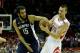 HOUSTON, TX - DECEMBER 22: Hamed Haddadi #15 of the Memphis Grizzlies fights for the ball with Donatas Montiejunas #20 of the Houston Rockets at the Toyota Center on December 22, 2012 in Houston, Texas. NOTE TO USER: User expressly acknowledges and agrees that, by downloading and or using this photograph, User is consenting to the terms and conditions of the Getty Images License Agreement. (Photo by Scott Halleran/Getty Images)