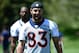 May 30, 2013; Englewood, CO, USA; Denver Broncos wide receiver Wes Welker (83) walks off the field following organized team activities at the Broncos training facility. Mandatory Credit: Ron Chenoy-USA TODAY Sports