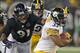 Dec 2, 2012; Baltimore, MD, USA; Pittsburgh Steelers running back Isaac Redman (33) runs past Baltimore Ravens linebacker Courtney Upshaw (91) for a gain during the game at M&T Bank Stadium. Mandatory Credit: Mitch Stringer-USA TODAY Sports