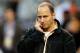 DETROIT, MI - OCTOBER 17: New York Yankees general manager Brian Cashman talks on the phone on the field during batting practice against the Detroit Tigers during game four of the American League Championship Series at Comerica Park on October 17, 2012 in Detroit, Michigan. (Photo by Gregory Shamus/Getty Images)