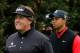 PEBBLE BEACH, CA - FEBRUARY 12: (L-R)Phil Mickelson and Tiger Woods are seen on the second tee during the final round of the AT&T Pebble Beach National Pro-Am at Pebble Beach Golf Links on February 12, 2012 in Pebble Beach, California. (Photo by Jeff Gross/Getty Images)