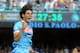 NAPLES, ITALY - MAY 12: Edinson Cavani of Napoli celebrates after scoring the goal 1-1 during the Serie A match between SSC Napoli and AC Siena at Stadio San Paolo on May 12, 2013 in Naples, Italy. (Photo by Giuseppe Bellini/Getty Images)