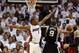 Jun 9, 2013; Miami, FL, USA; San Antonio Spurs point guard Tony Parker (9) drives against Miami Heat center Chris Bosh (1) during the second quarter of game two of the 2013 NBA Finals at the American Airlines Arena. Mandatory Credit: Derick E. Hingle-USA TODAY Sports