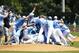 June 11, 2013; Chapel Hill, NC, USA; North Carolina Tar Heels players celebrate their victory over the South Carolina Gamecocks during the Chapel Hill Super Regional of the NCAA baseball tournament at Boshamer Stadium. The Tar Heels defeated the Gamecocks 5-4. Mandatory Credit: James Guillory-USA TODAY Sports