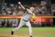 PHOENIX, AZ - JUNE 07: Starting pitcher Matt Cain #18 of the San Francisco Giants pitches against the Arizona Diamondbacks in the first inning at Chase Field on June 7, 2013 in Phoenix, Arizona. (Photo by Jennifer Stewart/Getty Images)
