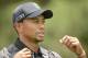 Jun 11, 2013; Ardmore, PA, USA; Tiger Woods walks after teeing off on the 2nd tee during the practice round of the 113th U.S. Open golf tournament at Merion Golf Club. Mandatory Credit: John David Mercer-USA TODAY Sports