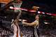 Jun 9, 2013; Miami, FL, USA; Miami Heat small forward LeBron James (6) blocks the shot of San Antonio Spurs center Tiago Splitter (22) during the fourth quarter of game two of the 2013 NBA Finals at the American Airlines Arena. Mandatory Credit: Derick E. Hingle-USA TODAY Sports