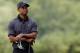 ARDMORE, PA - JUNE 11: Tiger Woods of the United States looks on during a practice round prior to the start of the 113th U.S. Open at Merion Golf Club on June 11, 2013 in Ardmore, Pennsylvania. (Photo by Rob Carr/Getty Images)