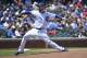 CHICAGO, IL- JUNE 7: Starting pitcher Travis Wood #37 of the Chicago Cubs delivers during the first inning against the Pittsburgh Pirates at Wrigley Field on June 7, 2013 in Chicago, Illinois. (Photo by Brian Kersey/Getty Images)