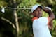 ARDMORE, PA - JUNE 12: Tiger Woods of the United States hits a shot during a practice round prior to the start of the 113th U.S. Open at Merion Golf Club on June 12, 2013 in Ardmore, Pennsylvania. (Photo by Andrew Redington/Getty Images)