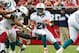 Sept. 30, 2012; Glendale, AZ, USA; Miami Dolphins running back Lamar Miller (26) runs the ball in the first half against Arizona Cardinals at University of Phoenix Stadium. Mandatory Credit: Jennifer Stewart-USA TODAY Sports