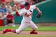 ST. LOUIS, MO - JUNE 2: David Freese #23 of the St. Louis Cardinals throws to first base in an attempt to turn a double play against the San Francisco Giants in the first inning at Busch Stadium on June 2, 2013 in St. Louis, Missouri. (Photo by Dilip Vishwanat/Getty Images)