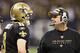 NEW ORLEANS, LA - DECEMBER 26: Quarterback Drew Brees #9 and Head Coach Sean Payton of the New Orleans Saints talk on the sidelines during a game against the Atlanta Falcons at Mercedes-Benz Superdome on December 26, 2011 in New Orleans, Louisiana. The Saints defeated the Falcons 45-16. (Photo by Wesley Hitt/Getty Images)