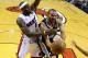 Jun 9, 2013; Miami, FL, USA; San Antonio Spurs point guard Tony Parker (9) drives to the basket defended by Miami Heat small forward LeBron James (6) in the first half during game two of the 2013 NBA Finals at the American Airlines Arena. Mandatory Credit: Larry W. Smith-EPA/Pool Photo-USA TODAY Sports