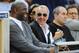 "You know I robbed you guys blind, right?" -Frank McCourt (R) to Magic Johnson (L), probably.