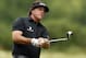ARDMORE, PA - JUNE 13: Phil Mickelson of the United States watches his tee shot on the second hole during Round One of the 113th U.S. Open at Merion Golf Club on June 13, 2013 in Ardmore, Pennsylvania. (Photo by Scott Halleran/Getty Images)