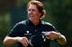 ARDMORE, PA - JUNE 13: Phil Mickelson of the United States tips his visor to the crowd after finishing the tenth hole during Round One of the 113th U.S. Open at Merion Golf Club on June 13, 2013 in Ardmore, Pennsylvania. (Photo by Drew Hallowell/Getty Images)
