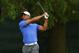 ARDMORE, PA - JUNE 13: Tiger Woods of the United States hits a shot during Round One of the 113th U.S. Open at Merion Golf Club on June 13, 2013 in Ardmore, Pennsylvania. (Photo by Drew Hallowell/Getty Images)