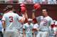Jun 8, 2013; Tallahassee, FL, USA; Indiana Hoosiers center fielder Kyle Schwarber (10) celebrates with teammates after a home run in the game against the Florida State Seminoles during the Tallahassee super regional of the 2013 NCAA baseball tournament at Dick Howser Stadium. Mandatory Credit: Melina Vastola-USA TODAY Sports