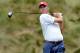 ARDMORE, PA - JUNE 13: Matt Kuchar of the United States hits his tee shot on the 18th hole during Round One of the 113th U.S. Open at Merion Golf Club on June 13, 2013 in Ardmore, Pennsylvania. (Photo by David Cannon/Getty Images)