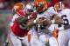 November 3, 2012; Columbus, OH, USA; Illinois Fighting Illini quarterback Nathan Scheelhaase (2) is sacked by Ohio State Buckeyes defensive lineman Adolphus Washington (92) at Ohio Stadium. Ohio State won the game 52-22. Mandatory Credit: Greg Bartram-USA TODAY Sports