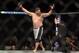 A victorious Roy Nelson celebrates after his UFC 159 knockout of Cheick Congo